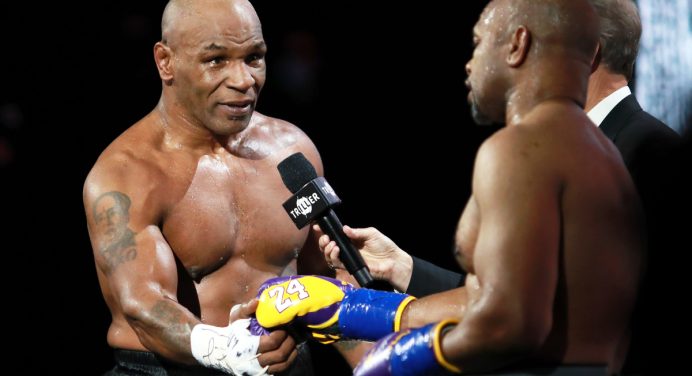 Evander Holyfield revela que sua equipe negocia trilogia com Mike Tyson