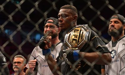 Jamahal Hill comemora a conquista do cinturão dos meio-pesados ao lado de sua equipe no UFC 283, no Rio de Janeiro.