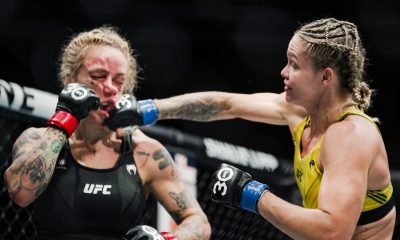 Tainara Lisboa acerta um soco durante sua luta de estreia no UFC, na qual venceu Jessica-Rose Clark por finalização.