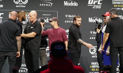 Leon Edwards e Colby Covington são contidos por seguranças depois da coletiva de imprensa do UFC 296