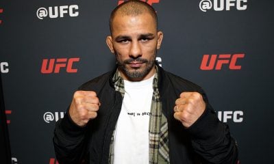 Alexandre Pantoja posa para foto no media day do UFC 323
