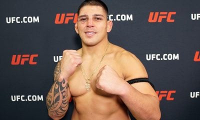 Brunno Hulk posando para foto após vitória no UFC 323