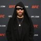 Jean Silva posando para foto após vitória no UFC 324