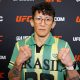 Com camisa customizada do Brasil, Virna Jandiroba posa para foto no media day do UFC Vegas 115